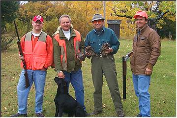 Four men and a dog