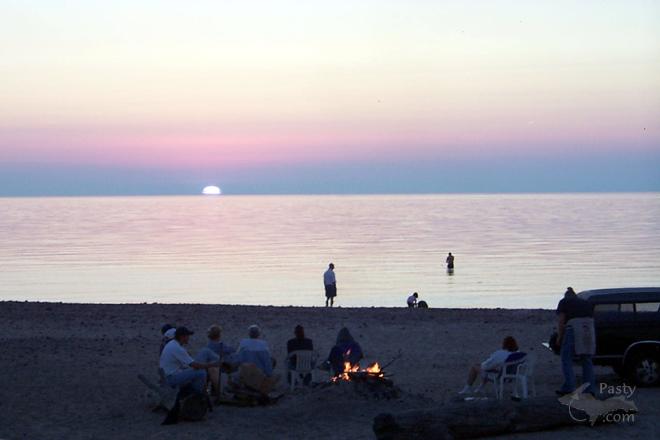 Beach fire at sunset